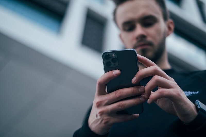 man checking phone